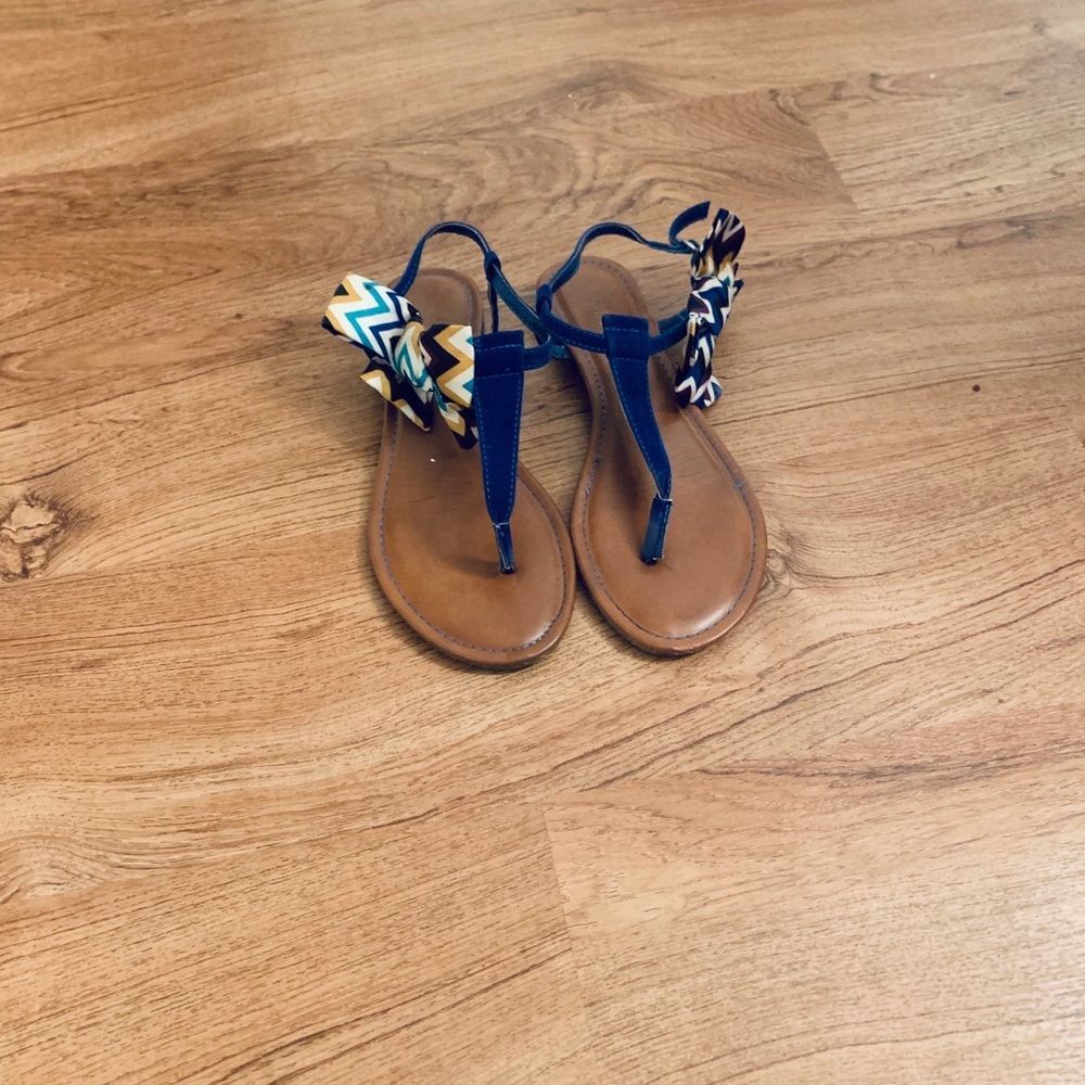 Blue suede gold bow t strap sandals